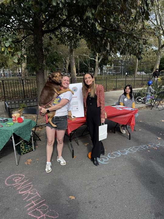 State Senator Julia Salazar at the North Brooklyn Dog Census table during the Cooper Park Block Party